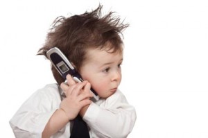 beautiful business kid use mobile phone